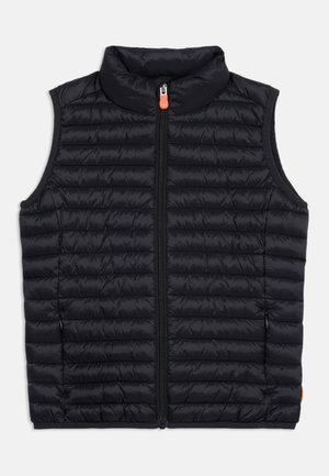 Fekete steppelt, ujjatlan mellény magas gallérral, elöl cipzárral és két cipzáras oldalzsebbel, könnyű meleg érdekében tervezve.