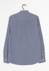 Langsleeve geruit overhemd in marineblauw en wit, met een klassieke kraag, knoopmanchetten en een gebogen zoom. Gemaakt van een lichtgewicht stof.