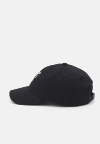 Black cotton baseball cap with a curved brim, adjustable strap at the back, and embroidered design on the front.
