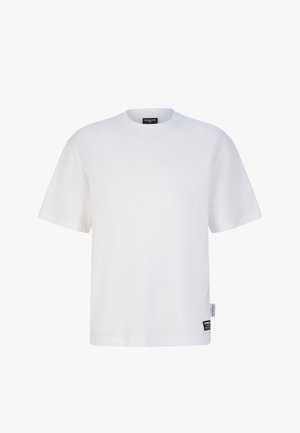 Weißes Baumwoll-T-Shirt mit kurzen Ärmeln, Rundhalsausschnitt und lockerer Passform. Verfügt über ein kleines Etikett auf der unteren linken Seite mit Branding.