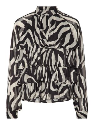 Blouse à imprimé zèbre noir et blanc avec des volants superposés, manches longues et col haut. Fabriquée en tissu léger et transparent.