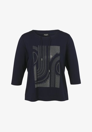 Navy blue shirt with three-quarter sleeves, featuring a geometric design of silver studs in various patterns on the front, round neckline.