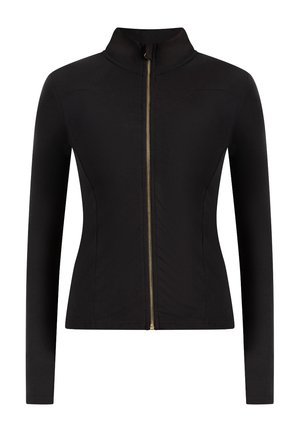 Chaqueta deportiva negra con cremallera frontal, cuello alto, mangas largas y detalle de cremallera dorada. Elaborada con una tela lisa y elástica.