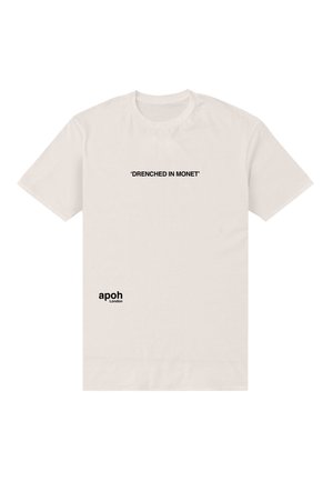 Cream cotton t-shirt featuring black text: “DRENCHED IN MONET” centered on the chest and “apoh London” at the lower side. Short sleeves.