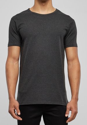 T-shirt gris foncé à col rond, coupe ajustée, en tissu doux avec manches courtes et texture lisse. Look simple et classique.