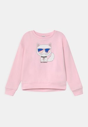 Sweatshirt rose avec un chat en cartoon portant des lunettes de soleil, en tissu doux, col rond et poignets côtelés, mettant en avant un design graphique ludique.