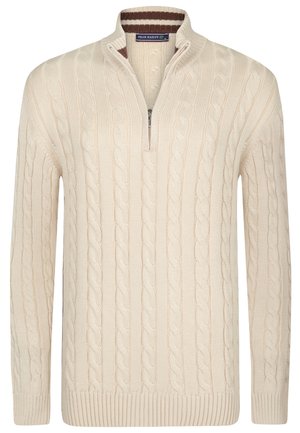 Maglione in maglia cable color crema con colletto a quarto di zip e polsini a coste. Presenta motivi a treccia intricati su tutto il tessuto.