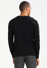 Levi's® GRAPHIC CREW - Langærmet T-shirt - better black