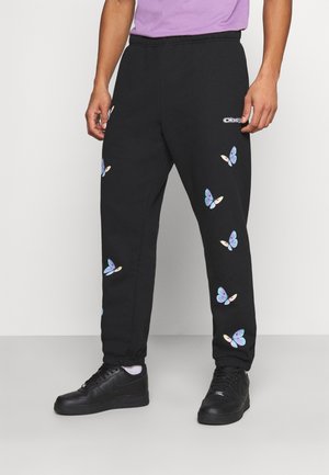 KYOTO - Tracksuit bottoms - black