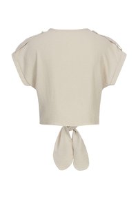 Top corto beige chiaro con maniche corte, tessuto testurizzato e dettaglio a fiocco sul retro. Presenta bottoni sui cuciture delle spalle.