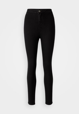 Čierne vysoké skinny džínsy vyrobené z denimu, s predným zapínaním na gombík a hladkou, elastickou štruktúrou bez viditeľných vzorov.