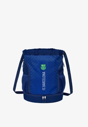 Sac à cordon bleu marine avec le logo FC Barcelone, fabriqué en matière texturée, doté de poches latérales en maille et d'un compartiment inférieur zippé.