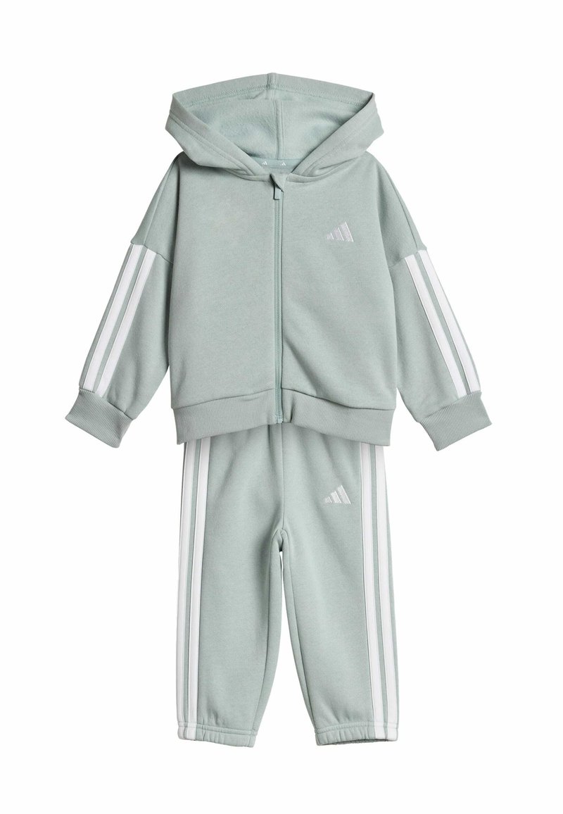 Light green tracksuit set with zip-up hoodie and matching pants. Features white stripes along the sleeves and sides, made from soft fabric.