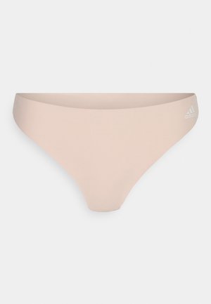Light pink bikini bottom with a smooth, stretchy material and a minimalistic design. Features a small white logo accent on the side.