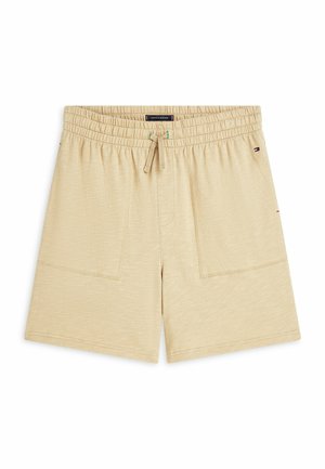Beige katoenen korte broek met elastische tailleband, trekkoord, voorzakken en klein Tommy Hilfiger-logo aan de rechterzijde.