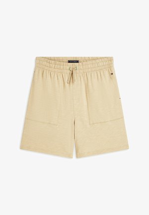 Pantaloncini beige in cotone con fascia elastica in vita, coulisse, tasche applicate frontali e piccolo logo Tommy Hilfiger sul lato destro.