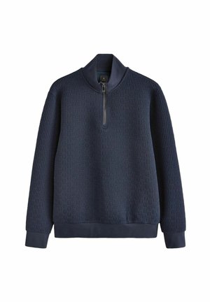 Marinefarbener Reißverschluss-Pullover mit einem strukturierten Muster, hoher Kragen, langen Ärmeln und einem einfarbigen Saum. Der Stoff wirkt weich und atmungsaktiv.
