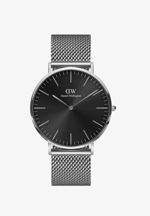 Stainless steel mesh watch; round black dial with silver hour markers, featuring brand name "Daniel Wellington" and silver hands.