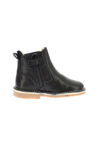 Stivale alla caviglia in pelle nera con zip laterale, suola beige e cuciture bianche a contrasto. Superficie leggermente testurizzata, design con tacco basso.