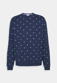 Navy blue sweatshirt in cotton blend featuring a crew neck, long sleeves, and scattered white logo patterns throughout. Ribbed cuffs and hem.