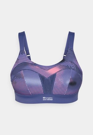Paarse sportbeha met een mesh ontwerp en roze en zwarte stippenpatronen, verstelbare banden en een gebrandmerkte elastische band aan de onderkant.