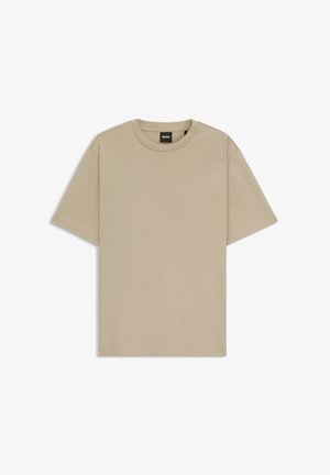 Beige crew-neck t-shirt made of soft cotton. Features short sleeves and a relaxed fit, with a subtle brand tag at the neckline.