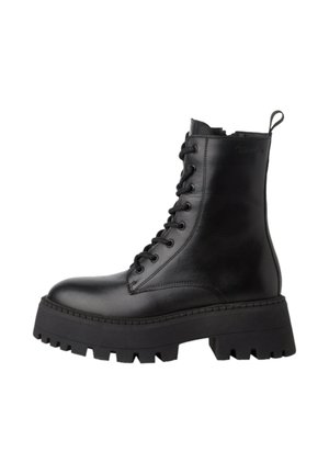 Schwarze Leder-Stiefeletten mit Schnürverschluss, runder Zehenpartie, imposanter Plateausohle und einer Lasche an der Rückseite für einfaches An- und Ausziehen.