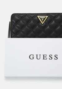 Guess GIULLY CHEQUE ORGANIZER - Lompakko - black