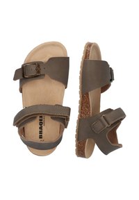 Sandalias de cuero marrón con dos correas ajustables con hebilla, una plantilla de corcho y suelas de goma texturizadas para un mejor agarre.