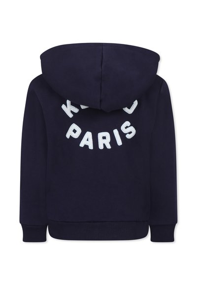 Felpa navy con un grande design rotondo ricamato che riporta la scritta "KIDS PARIS" in bianco. Dotata di cappuccio con cordini e polsini a coste.