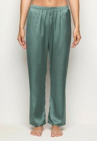Satijnen pyjamabroek in gedempt groen, met een elastische tailleband, rechte pijpen en een gladde, glanzende structuur.