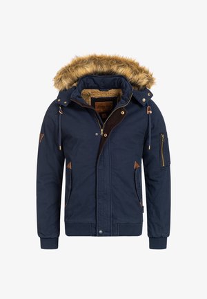 Navy blue jacket with a faux fur hood, corduroy accents, zippered pockets, and textured lining. Featuring a zip and button closure.