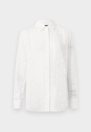 Witte blouse met lange mouwen en een subtiel geometrisch patroon, voorzien van een knopsluiting aan de voorkant, kraag en manchetten; gemaakt van luchtige stof.