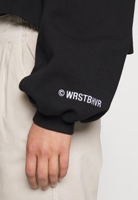 WRSTBHVR Sudadera - black