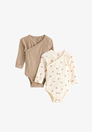 Two long-sleeve bodysuits: one beige ribbed, wrap design; one cream with light brown bear print; both with snap closures at the bottom.