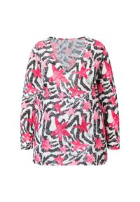 Langarm V-hals top met zwart-witte zebra strepen en felle roze sterrenmotieven over de stof.