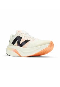 Running shoe with a breathable white mesh upper, black 'N' logo, orange outsole, textured surface, and multi-color gradient on midsole.