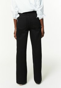 Next FLARED LEG  - Stoffhose - black