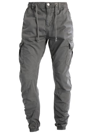 Cargo byxor i mörkgrått tyg med elastisk midja, dragsko och sidofickor samt en tapered ben-design.