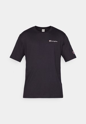 Čierne bavlnené tričko s krátkym rukávom a okrúhlym výstrihom, s malým bielym logom Champion na hrudi a rukáve. Hladká textúra.