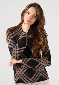 Pullover a maniche lunghe con texture a costine e motivo geometrico in nero e malva. Design aderente con scollo rotondo.