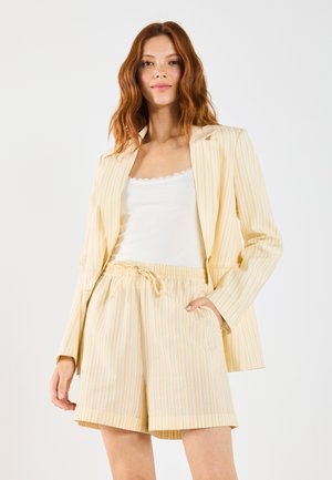 Pantaloni scurți - light yellow