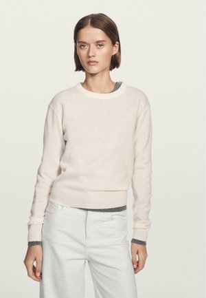- Sweter