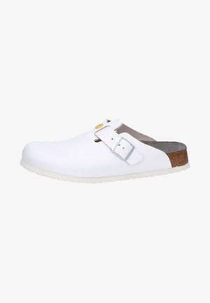 White clogs with a smooth finish, adjustable strap, and contrasting brown cork footbed. Lightweight outsole for comfort and durability.