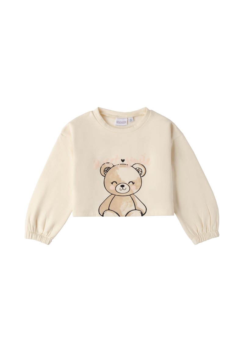 Sudadera corta color crema con mangas largas y abullonadas. Presenta una impresión de un oso con un corazón encima y una textura de tela suave y lisa.
