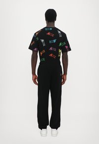 Icecream RUNNING DOG SWEATPANTS - Tracksuit bottoms - black