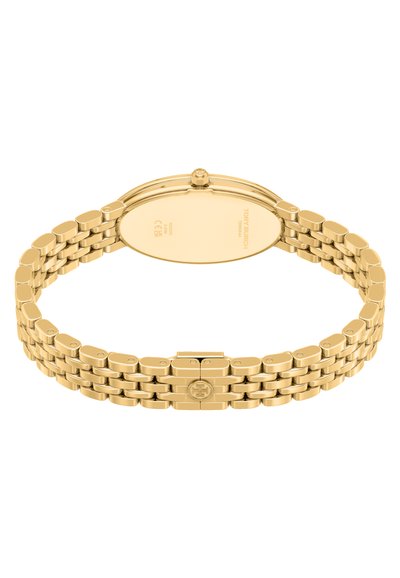 Montre-bracelet en métal doré avec bracelet à maillons et fermoir, montrant le dos du boîtier gravé avec les marques de la marque et de la certification.