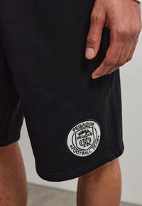 Pegador FRANKFURT - Παντελόνι φόρμας - black