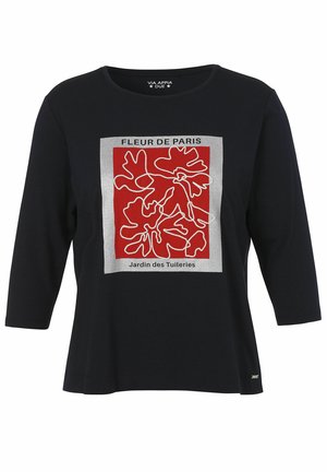 Schwarzes Langarmshirt mit rotem und silbernem quadratischem Blumenmotiv und dem Text "Fleur de Paris" und "Jardin des Tuileries" auf der Vorderseite.