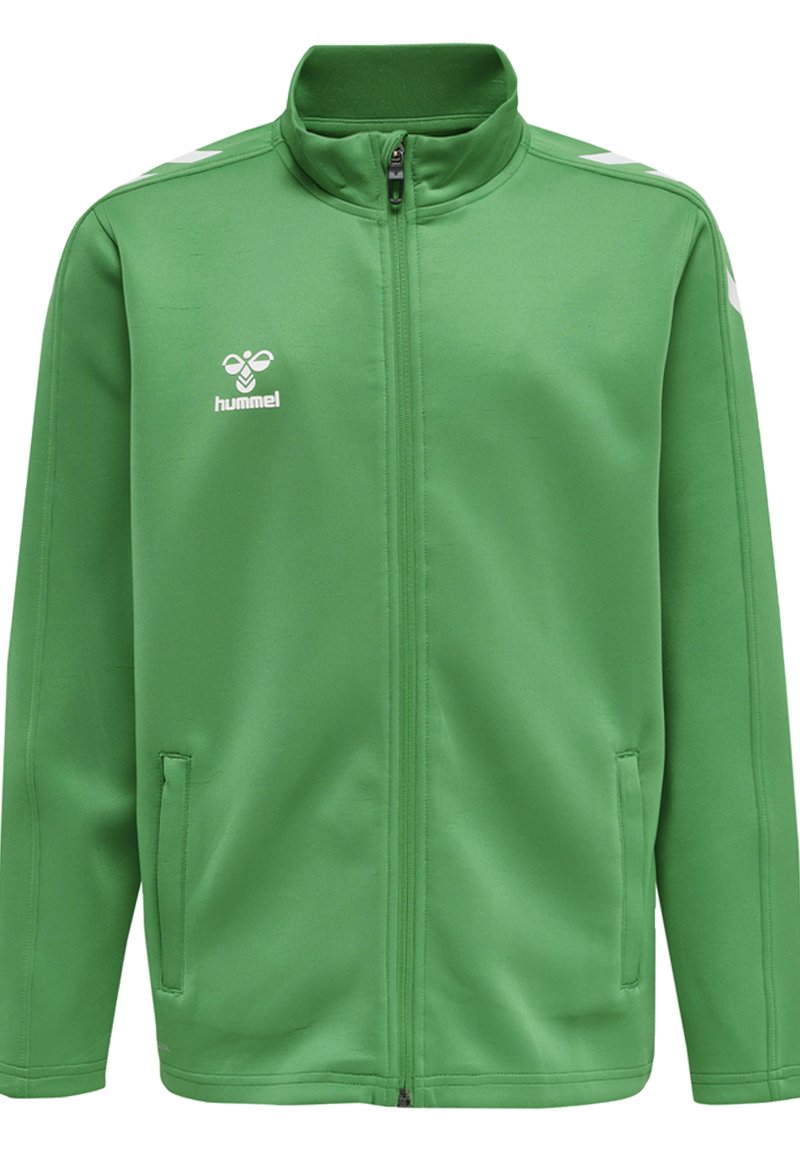 Giacca sportiva verde in tessuto morbido, con colletto alto, chiusura zip, due tasche laterali e logo e dettagli bianchi Hummel.